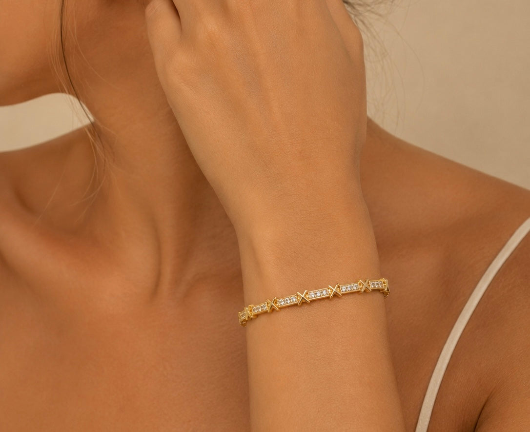 PULSEIRA DOURADA COM DETALHE EM X
