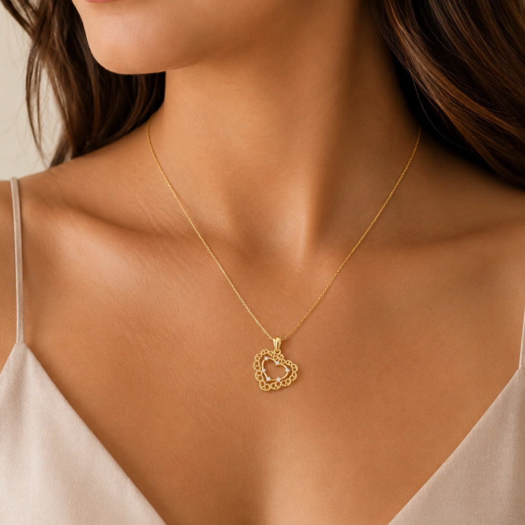 Pingente Dourado Coração Vazado Ponto de Luz